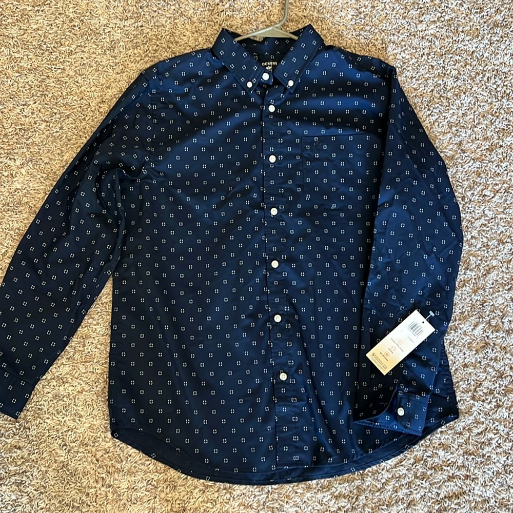Navy blue colored dress shirt with tags